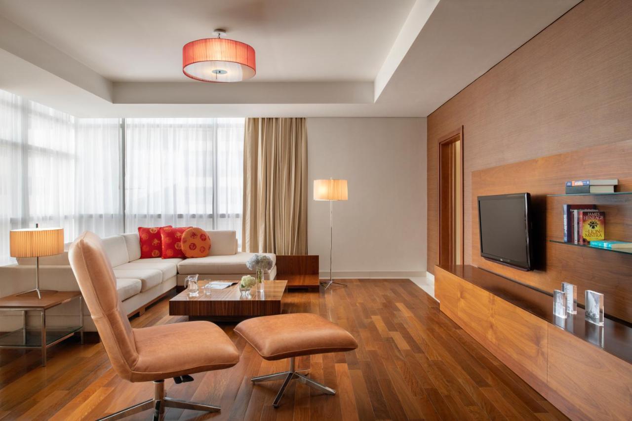 Fraser Suites Doha Exterior photo A living room at the hotel