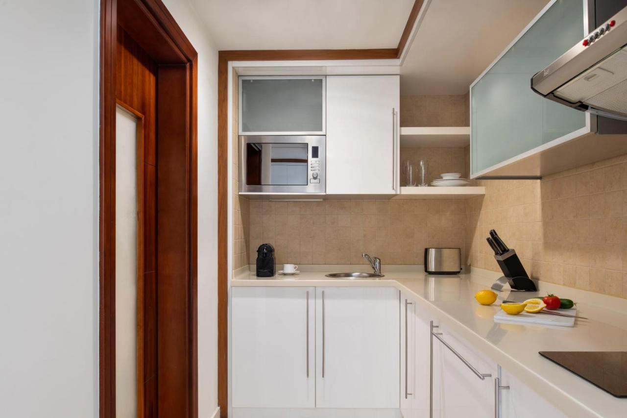 Fraser Suites Doha Exterior photo A typical kitchen