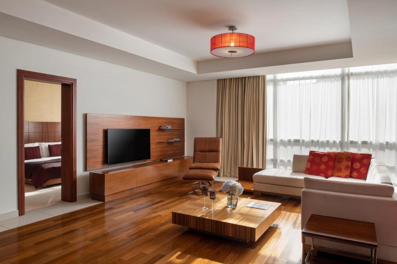 Fraser Suites Doha Exterior photo A living room in a suite at the hotel