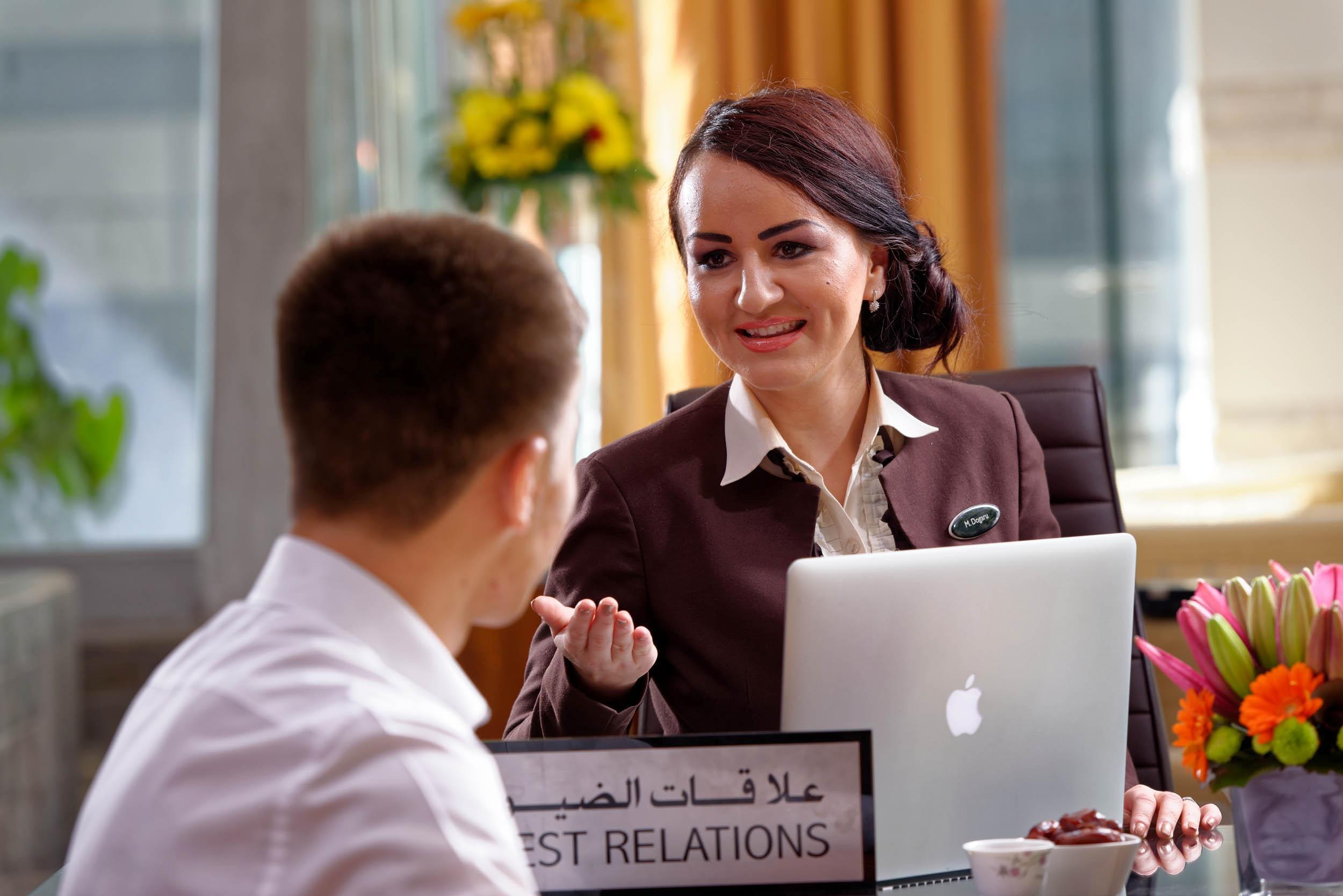 Fraser Suites Doha Exterior photo A guest relations manager at work