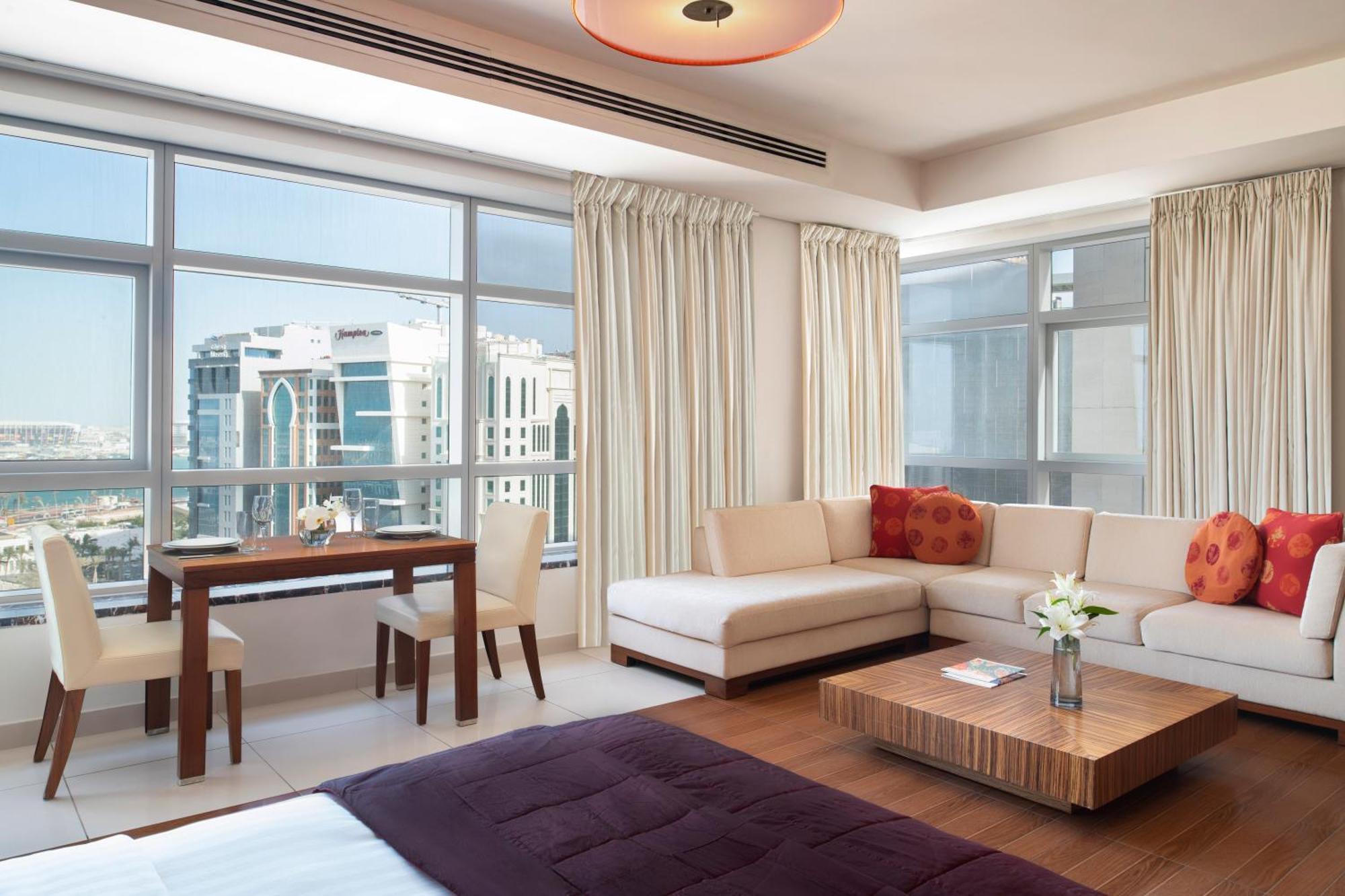 Fraser Suites Doha Exterior photo A living room in a typical apartment