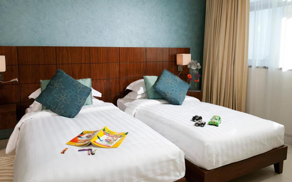 Fraser Suites Doha Exterior photo A typical bedroom at the hotel