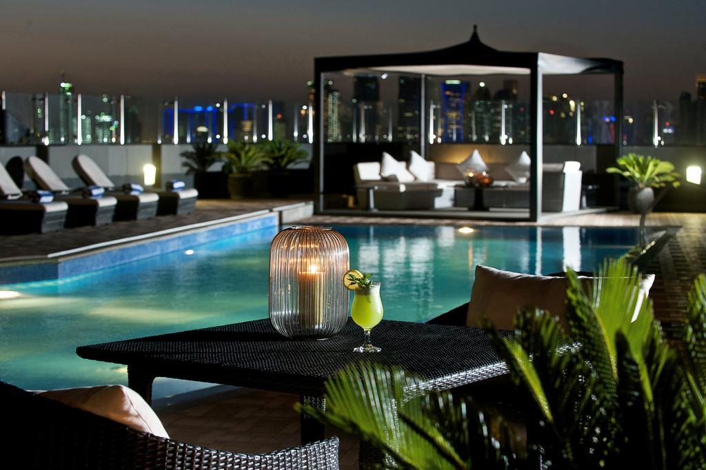 Fraser Suites Doha Exterior photo The pool at the 101 Sky Lounge